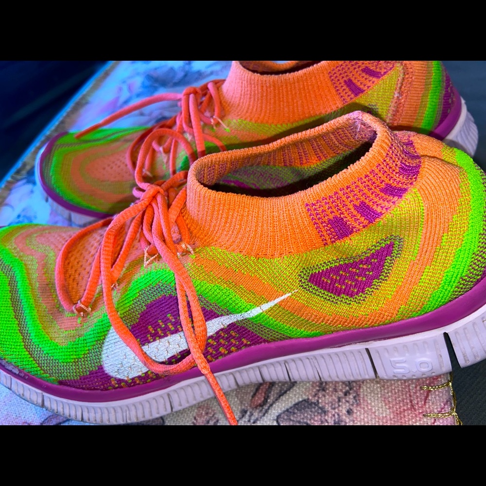 Neon Nike Free running shoes